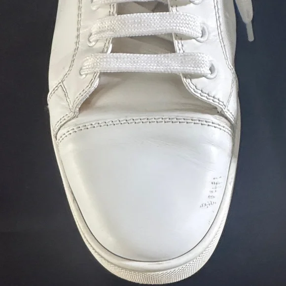Christian Louboutin Men’s White Leather Sneakers with Iconic Red Soles